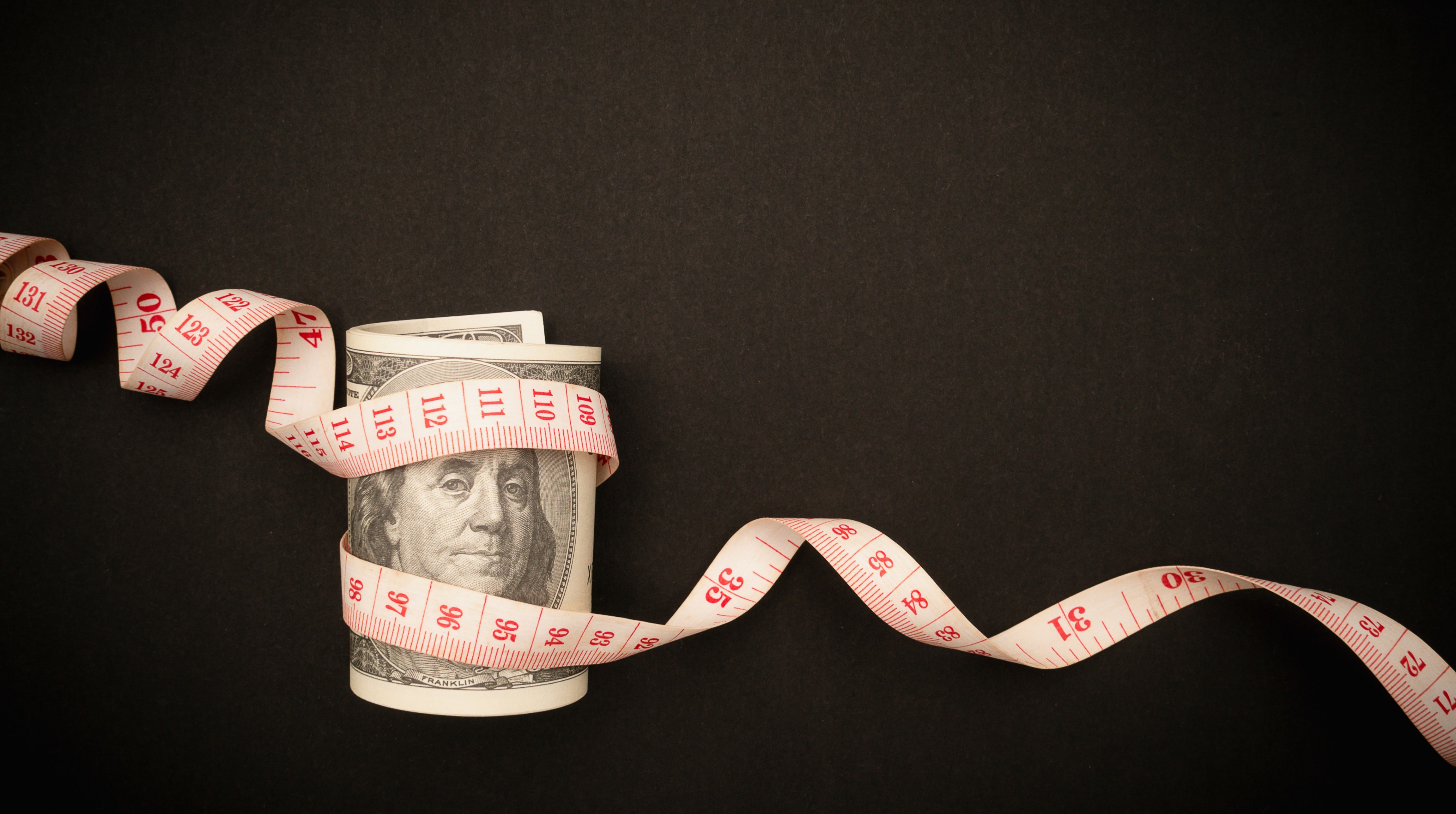 finance numbers tape money