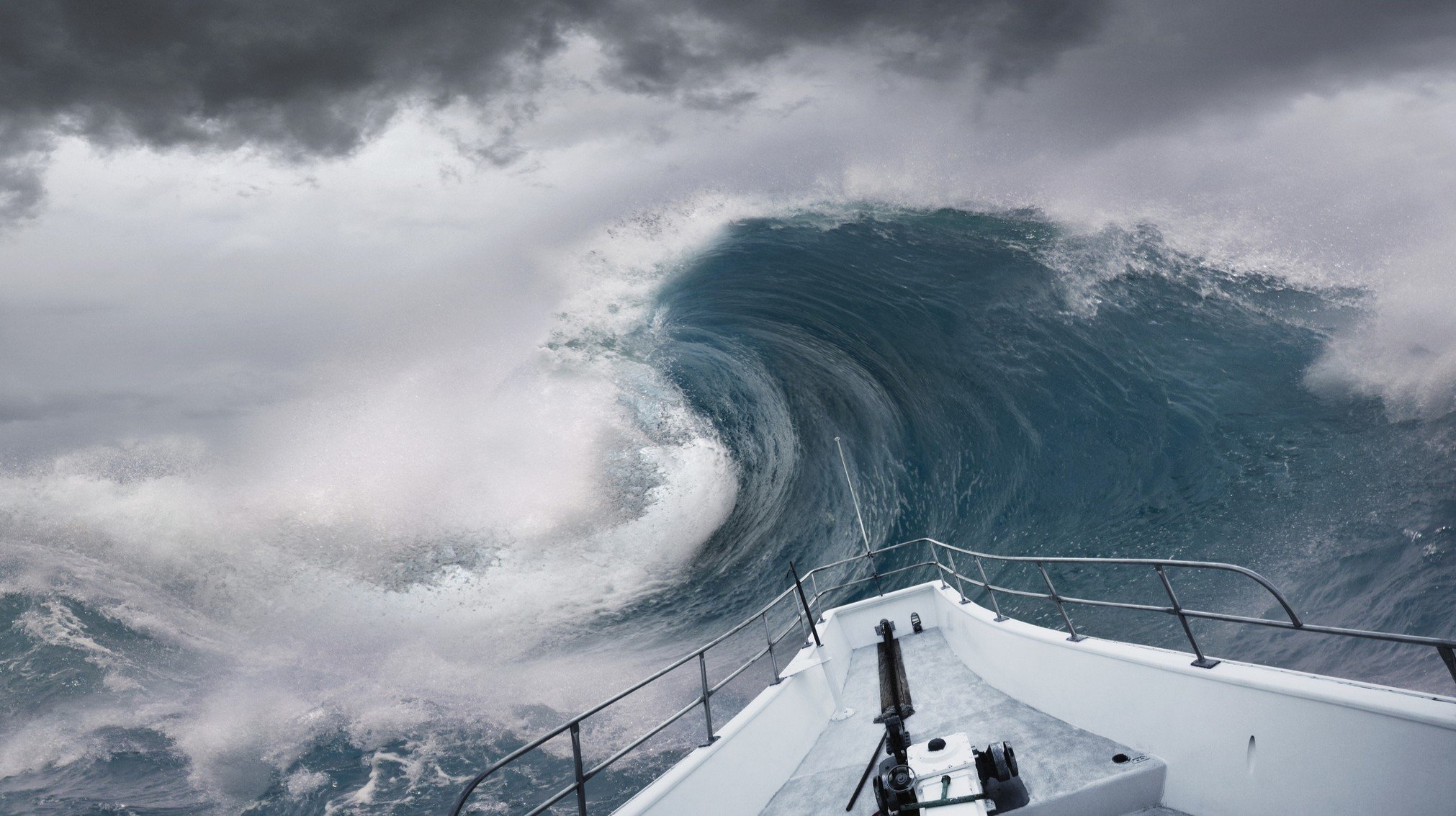 big wave over ship in storm